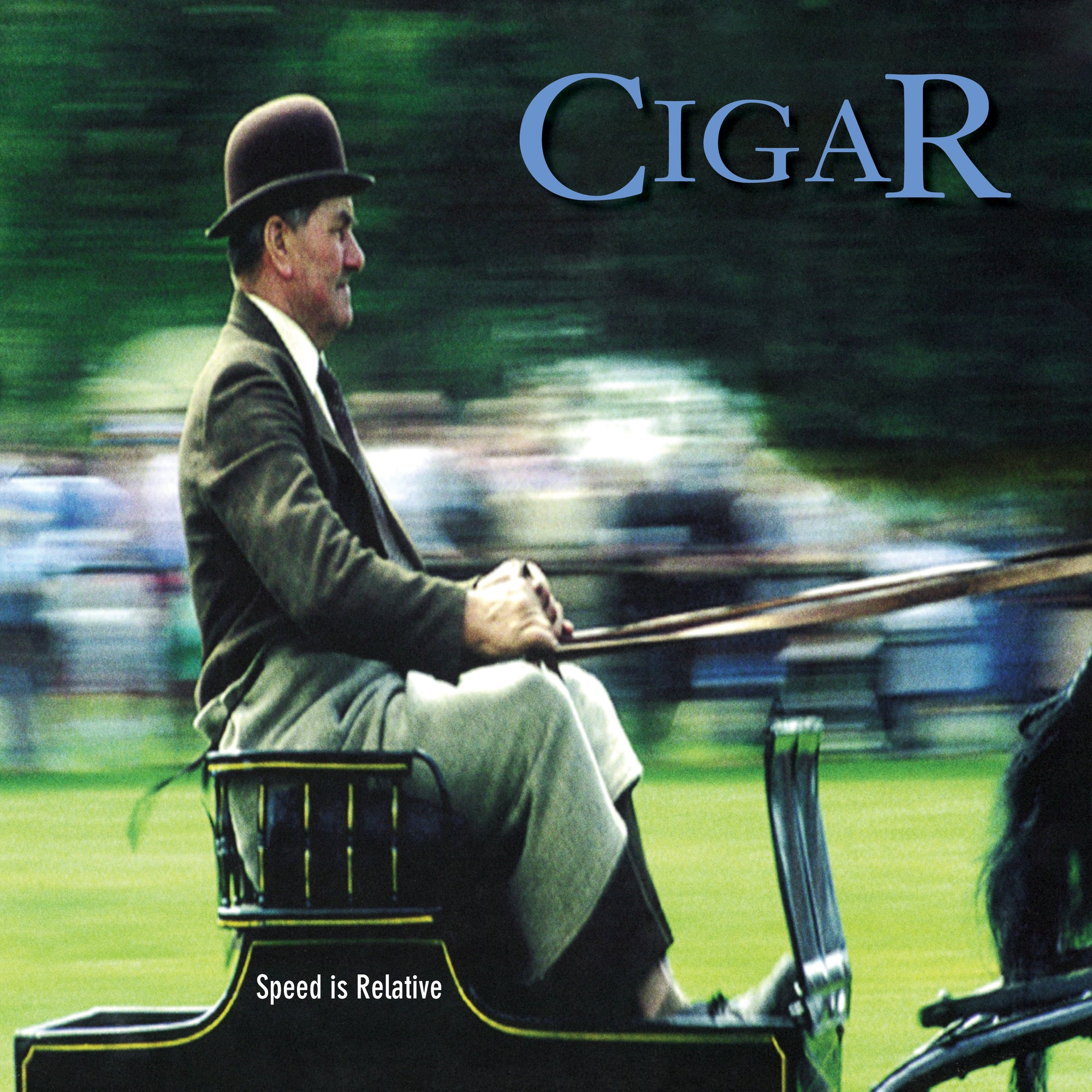 A man in vintage attire and bowler hat speeds by in a horse-drawn carriage, green background blurred. The word Cigar and the phrase Speed is Relative reference the brand’s 1999 debut album on Black Vinyl LP.