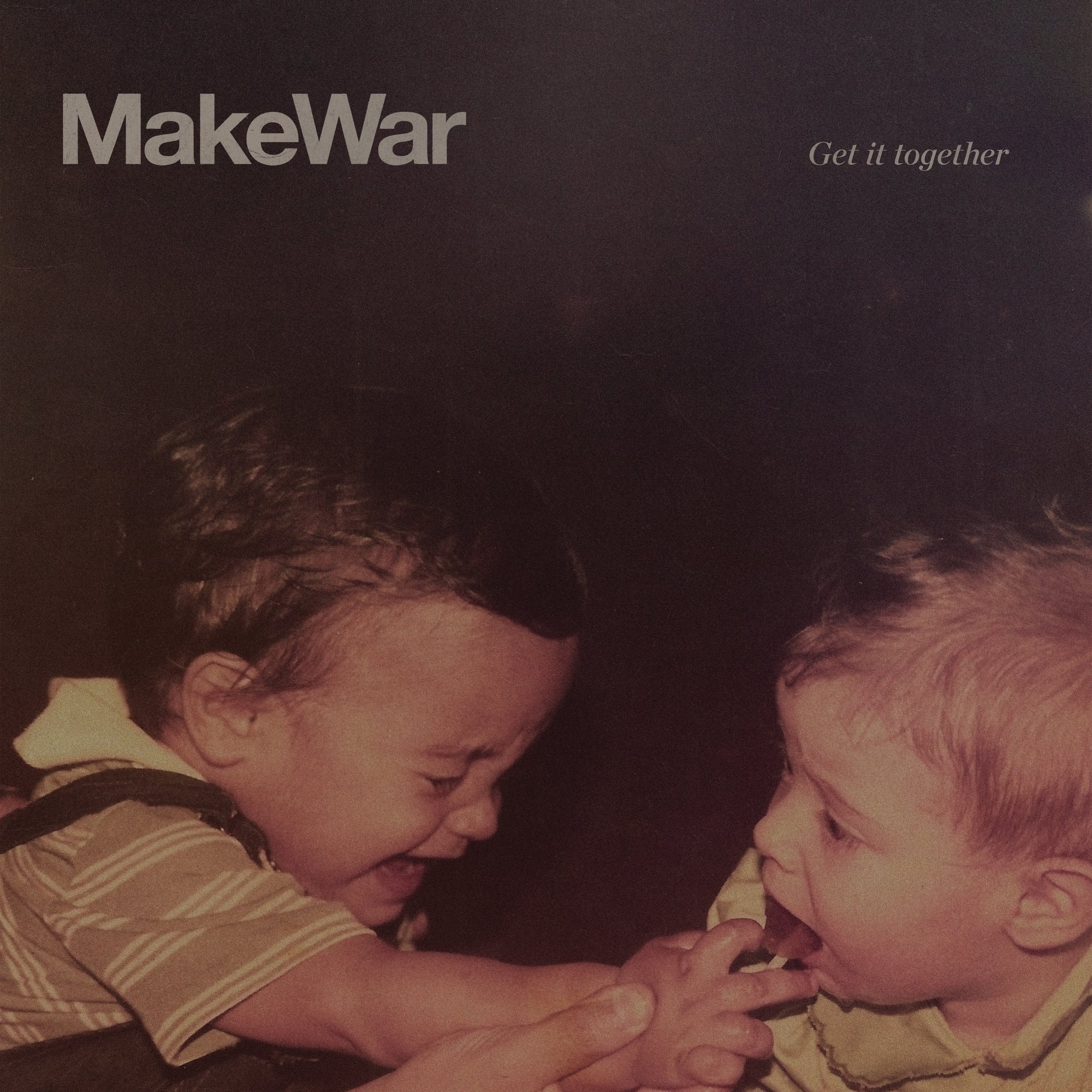 Two young children laugh and play in a sepia-toned photo. Makewar appears in the top left corner, with Get It Together in small letters on the top right, reflecting the Latinx hardcore energy of Makewar.