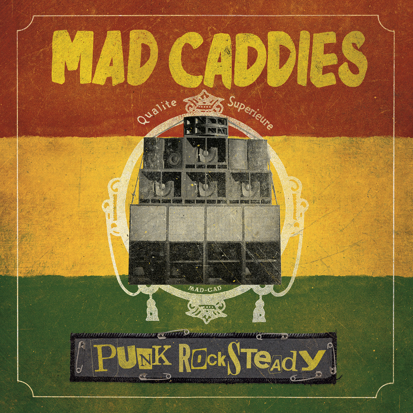 Album cover for Mad Caddies Punk Rocksteady, showing a vintage speaker over a red, yellow, and green backdrop with bold text promoting reggae-punk covers of classic punk tracks.
