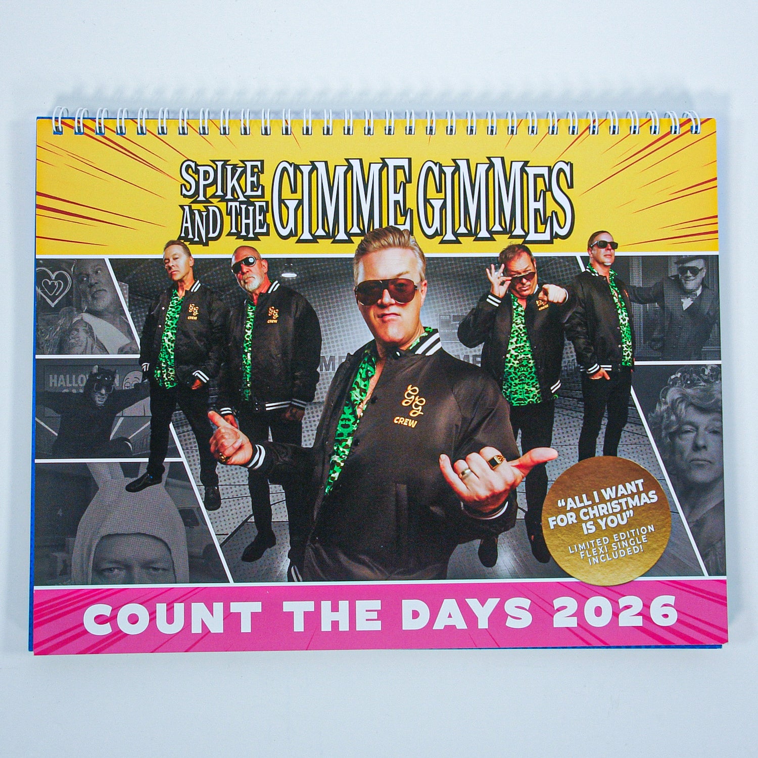 calendar for Spike and The Gimme Gimmes shows four men in black jackets and sunglasses. A pink banner reads "Count the Days 2026," teasing a Flexi release of "All I Want For Christmas Is You.